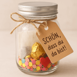 Willkommensglas als Geschenk - gefüllt mit Konfetti und Naschereien
