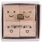 Preview: Mini-Stempel-Set Smile mit vier Holzstempeln in einer Pappschachtel mit transparentem Klarsichtdeckel