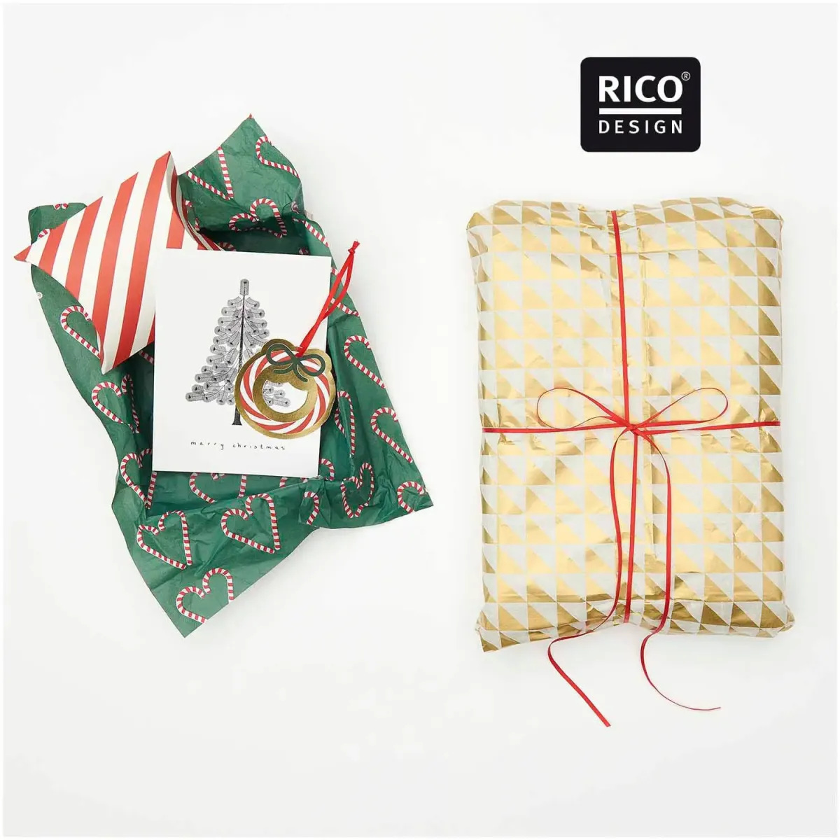 Seidenpapier mit Zuckerstangen-Herzen als dekorative Auskleidung einer Geschenkbox