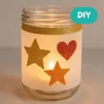 DIY-Windlicht selbermachen mit Glitzerkarton und Transparentpapier